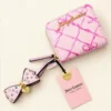 Cartera Rosa Juicy Couture con Moño