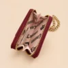 Cartera Muñequera Juicy Couture Burgundy Velour con Cadena Dorada